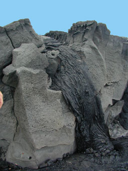 Pahoehoe flow over older, eroded, lava flow